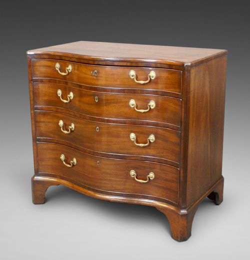 A Hepplewhite Period Serpentine Chest of Drawers