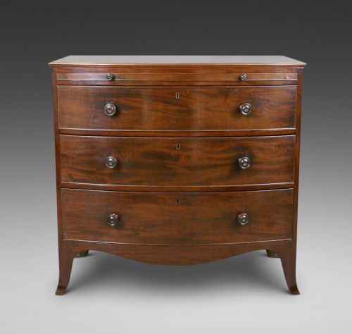 A George III Mahogany Bow-fronted Chest.