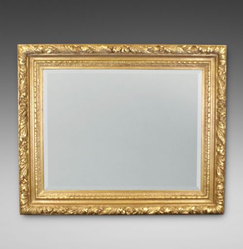 A VERY LARGE GILT FRAME WALL MIRROR