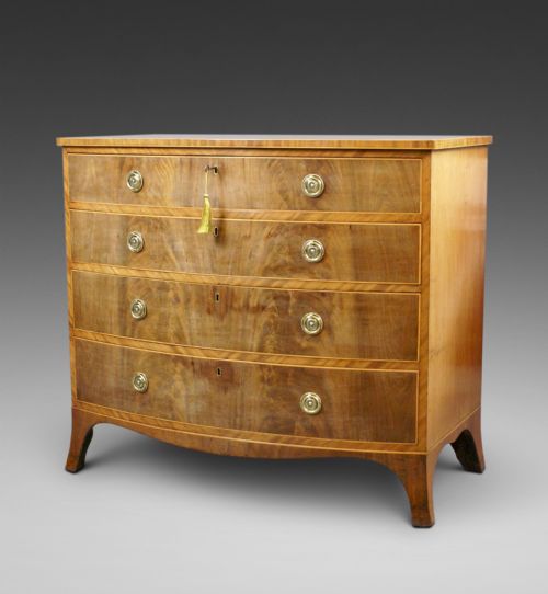 A George III Flame Mahogany Bow Fronted Chest