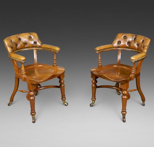 A Pair of Mahogany & Leather Arm Chairs