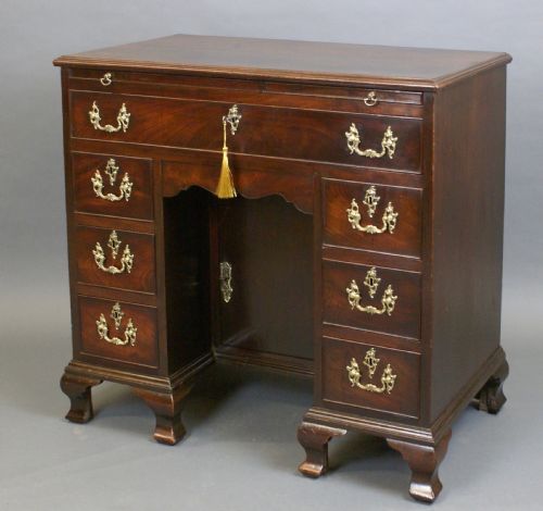 A CUBAN MAHOGANY KNEEHOLE DESK - ADDITIONAL PHOTO 1