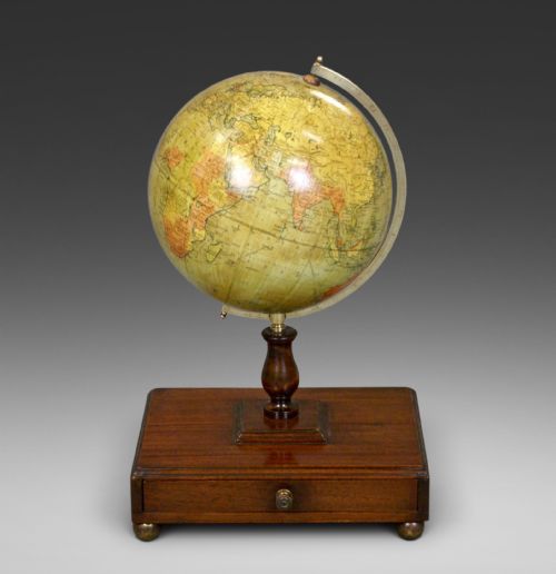 A Terrestrial Globe & Accompanying Atlas