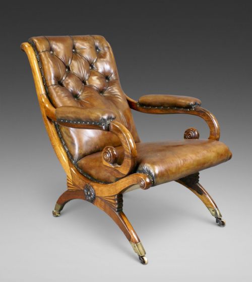 An Elegant Rosewood and Leather Arm Chair