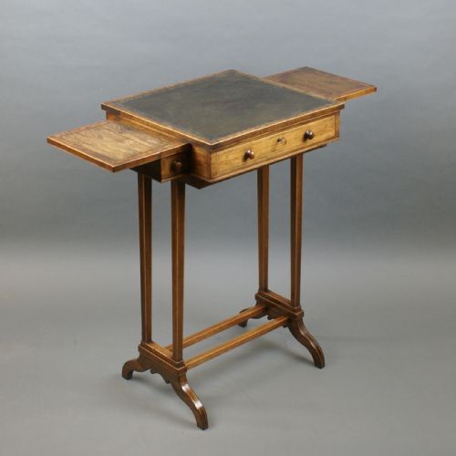 A SMALL REGENCY ROSEWOOD WRITING TABLE - ADDITIONAL PHOTO 2