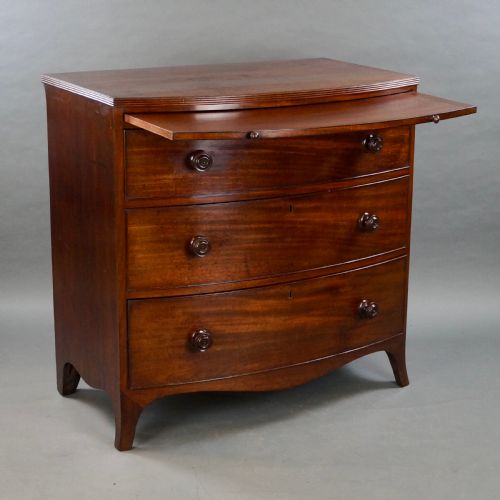 A GEORGE III BOWFRONTED CHEST - ADDITIONAL PHOTO 4
