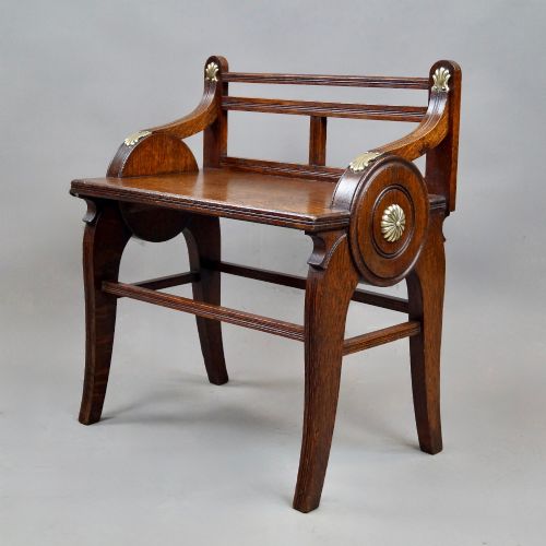 AN OAK AND BRASS MOUNTED HALL BENCH BY JAMES SHOOLBRED CO - ADDITIONAL PHOTO 2
