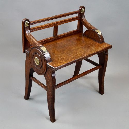 AN OAK AND BRASS MOUNTED HALL BENCH BY JAMES SHOOLBRED CO - ADDITIONAL PHOTO 3
