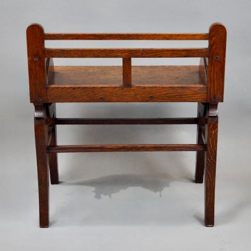 AN OAK AND BRASS MOUNTED HALL BENCH BY JAMES SHOOLBRED CO - ADDITIONAL PHOTO 4