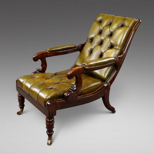 A WILLIAM IV BUTTON LEATHER RECLINING CHAIR