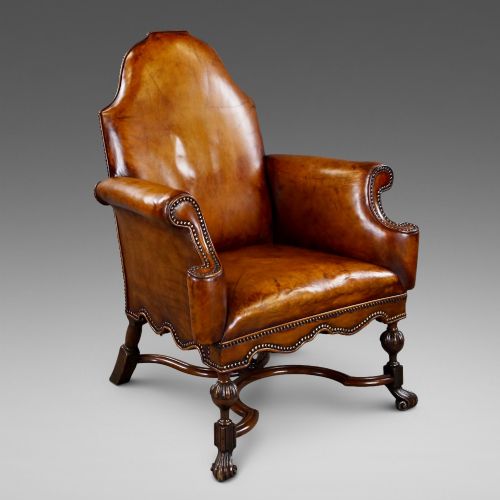 A 18TH CENTURY STYLE WALNUT LEATHER ARM CHAIR