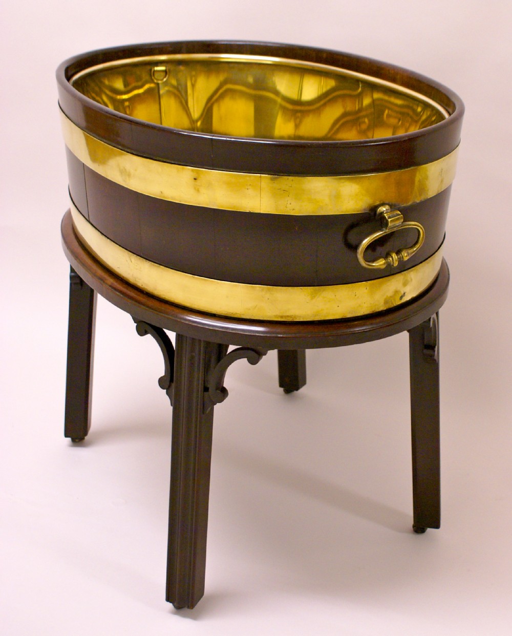 A Chippendale period mahogany and brass bound Wine Cooler in very original condition