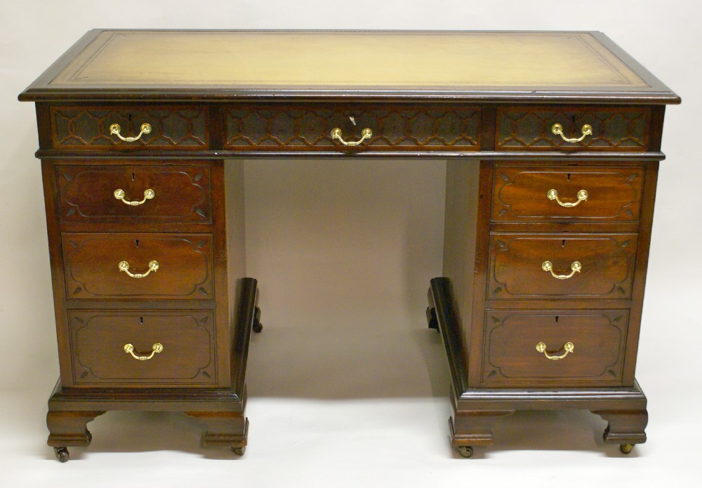 A late 19th century mahogany pedestal desk By Druce & Co.
