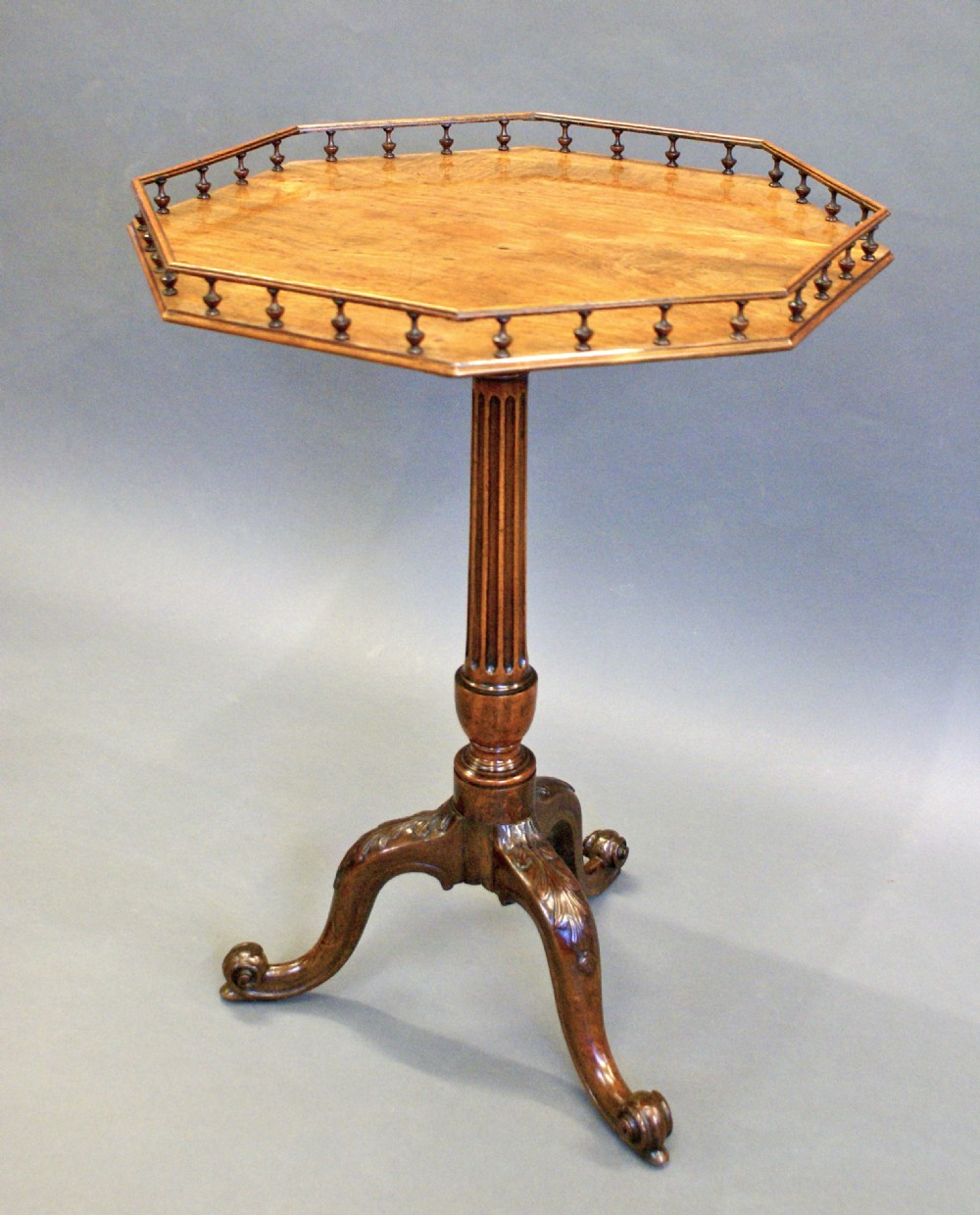 A fine George III mahogany gallery top tripod table
