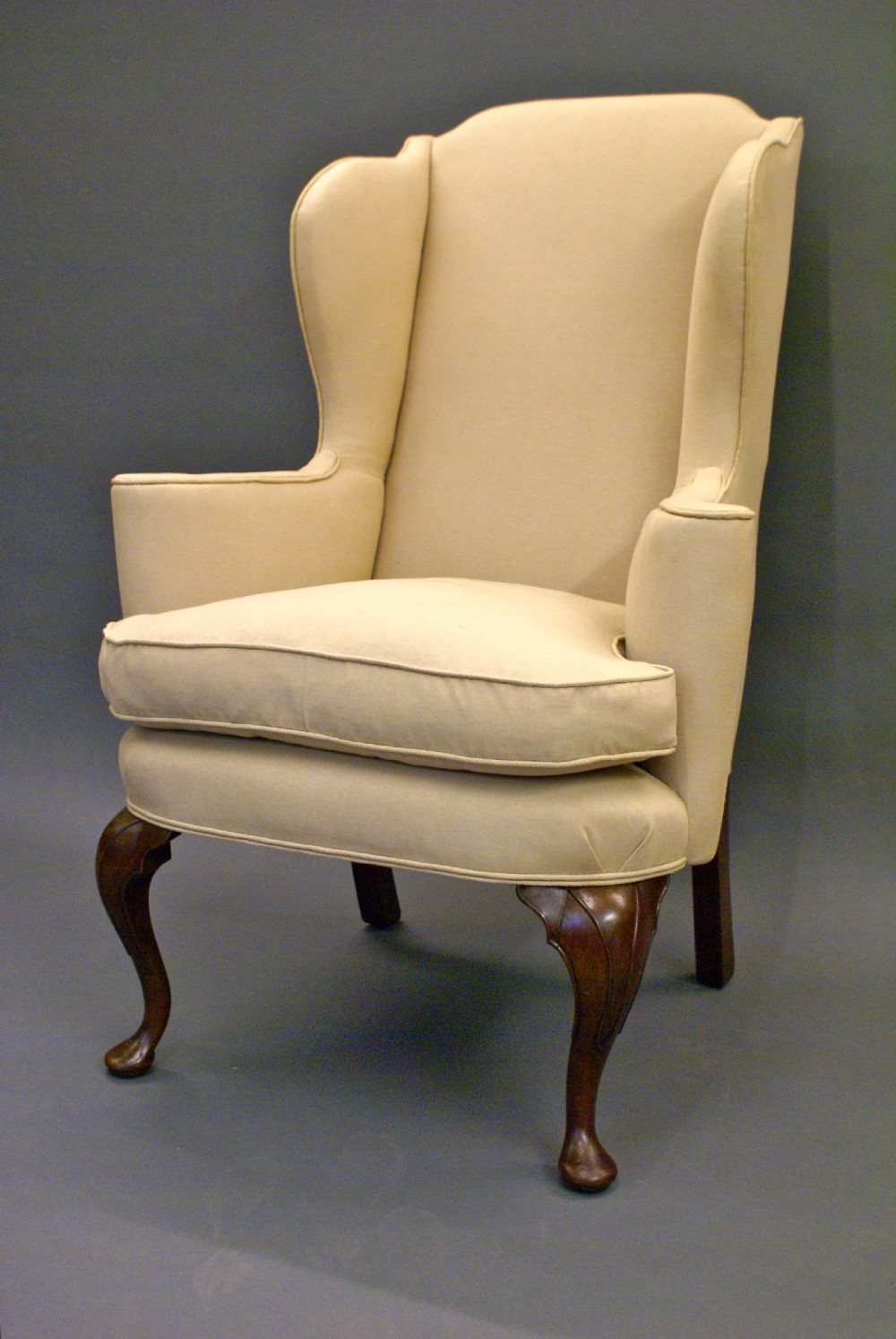 A George I style walnut wing chair