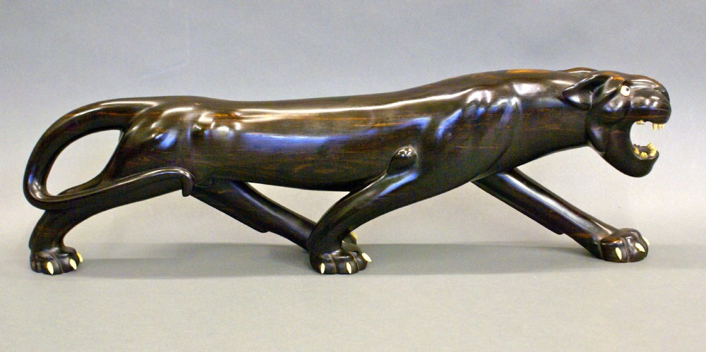 A large Calamander wood sculpture of a Panther