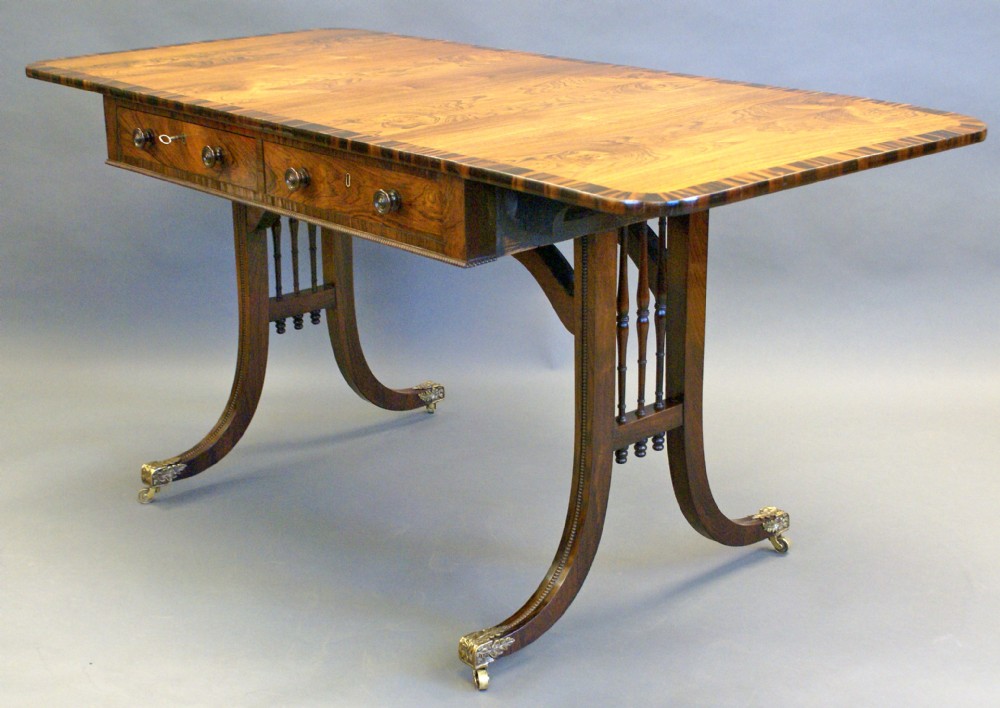 A rare rosewood & calamander sofa table attributed to Gillows