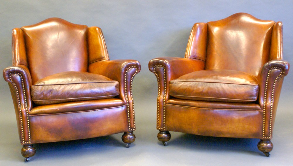 A superb pair of 1930's leather club chairs