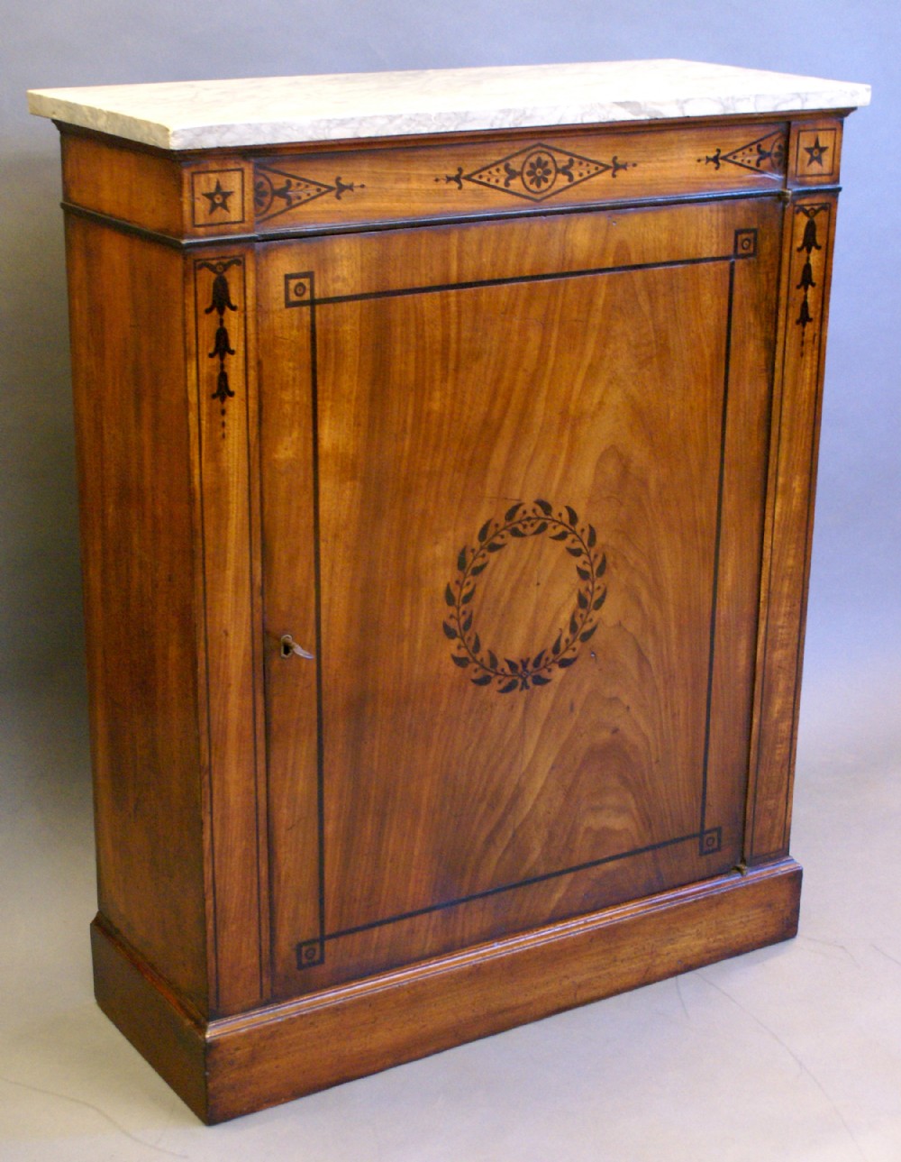 A Regency period single door mahogany side cabinet