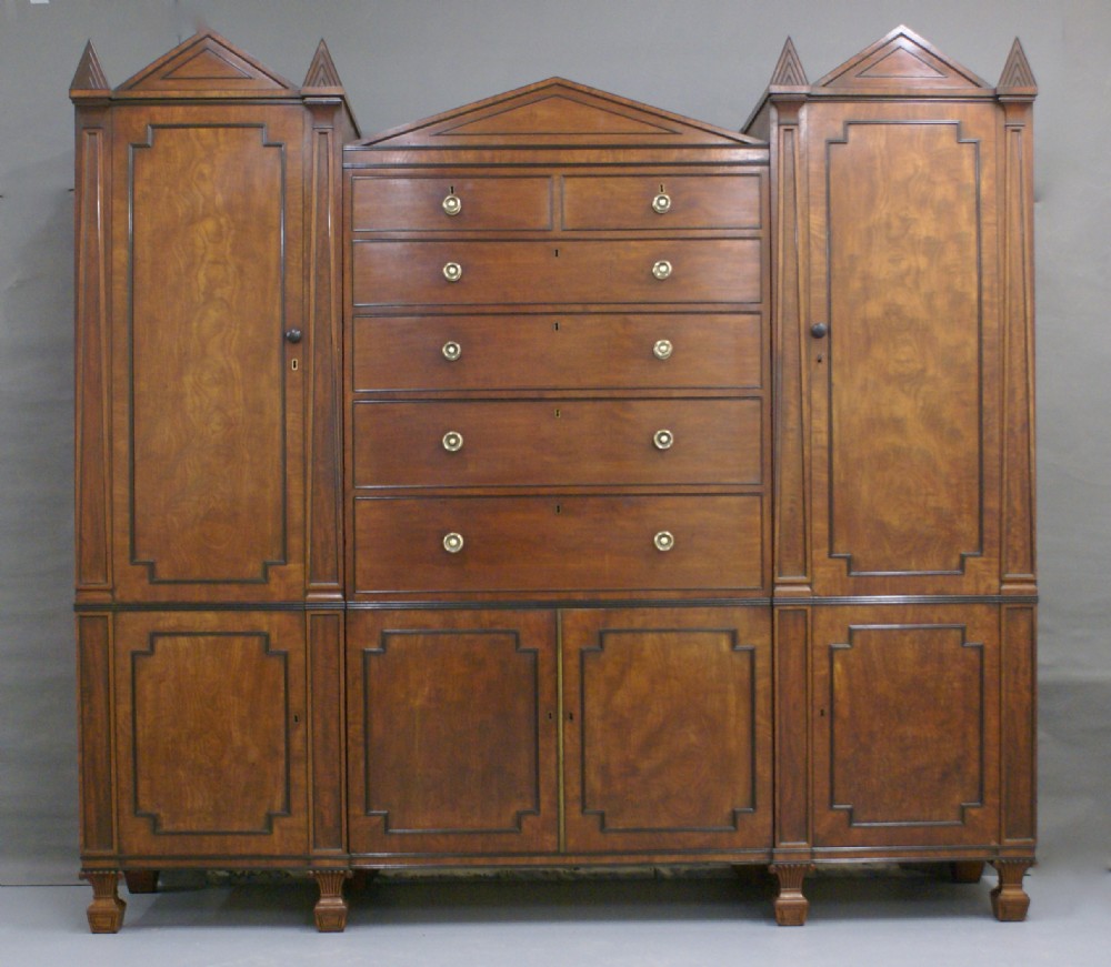 A superb Regency mahogany wardrobe attributed to Holland & Sons