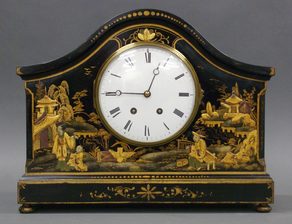 A 1930,s Chinoiserie Black lacquered mantle clock 