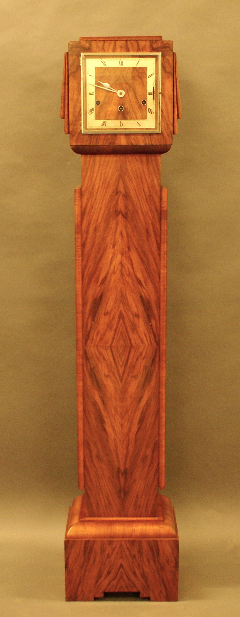 A very attractive French Art Deco long case clock.