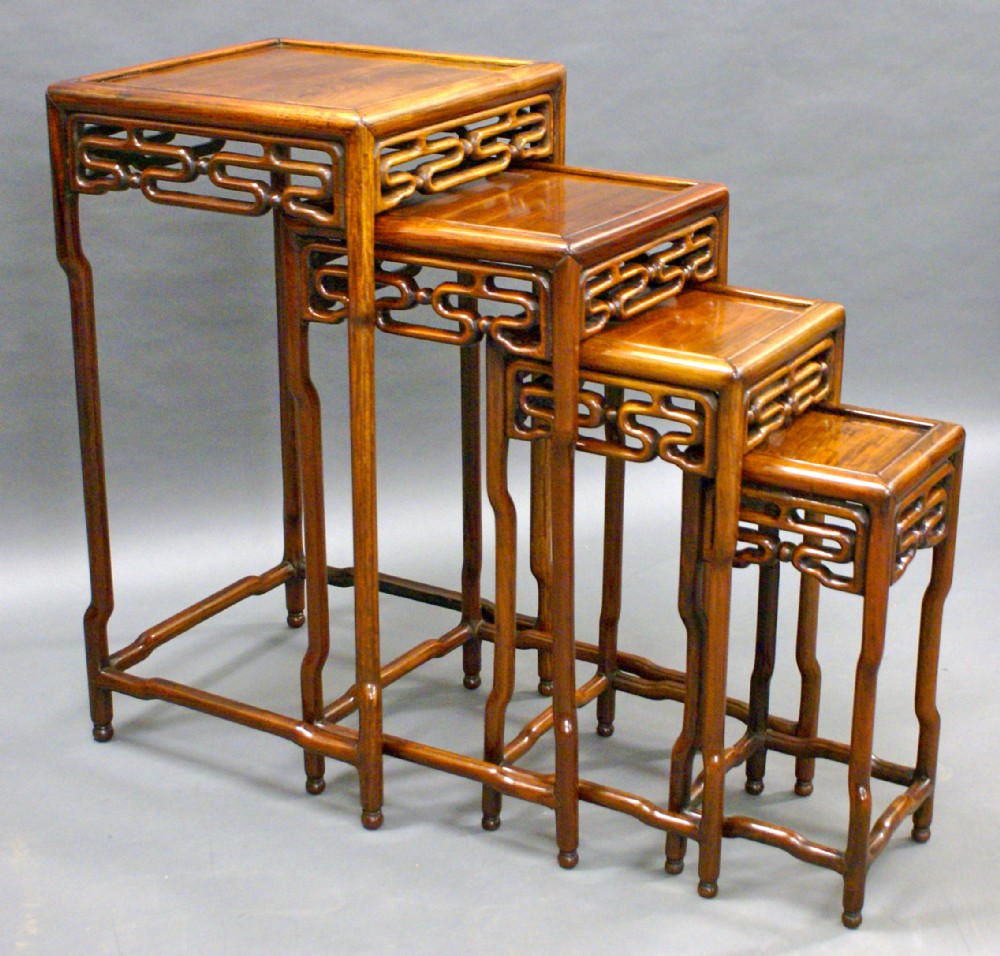 A set of 19th century Chinese hard wood quartetto tables