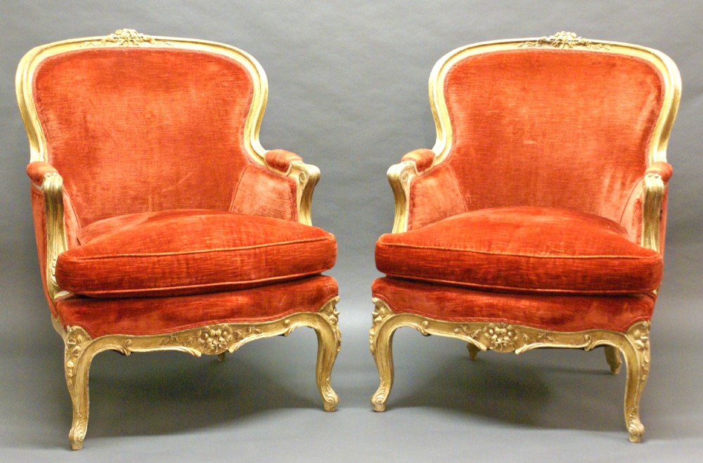 A large pair of 19th century painted arm chairs