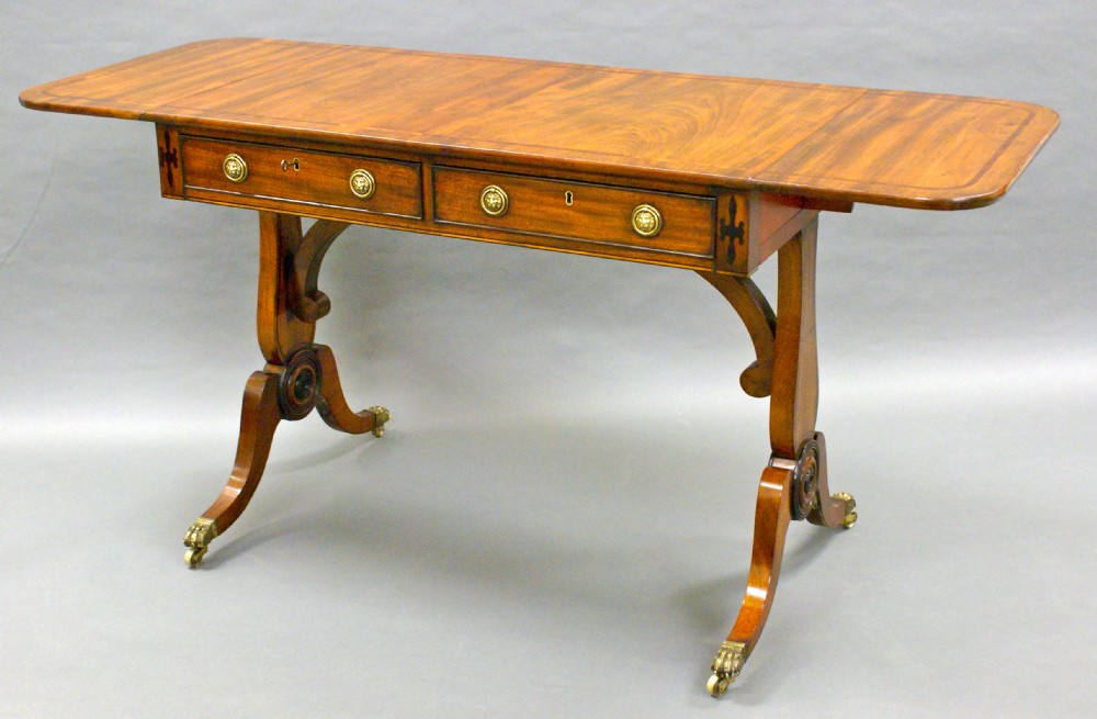 A Regency mahogany sofa table of very desirable shallow proportions