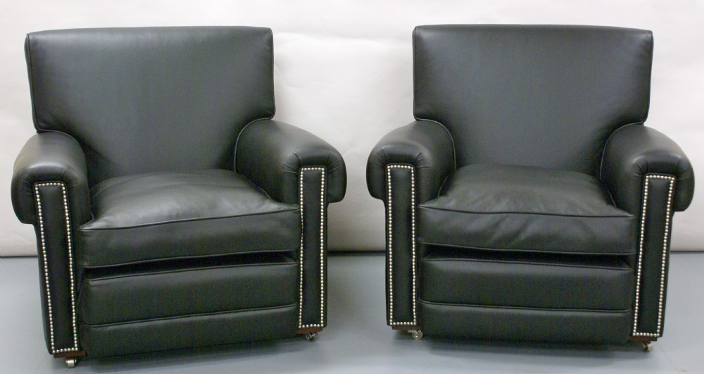 A pair of Maple's leather club chairs
