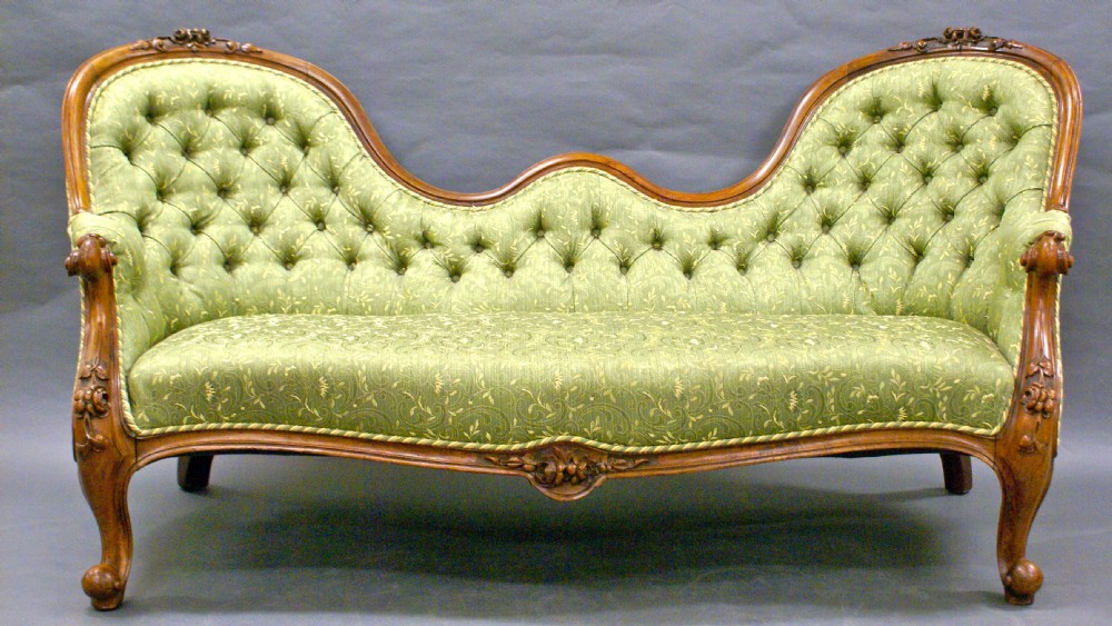 A superb quality Victorian walnut sofa