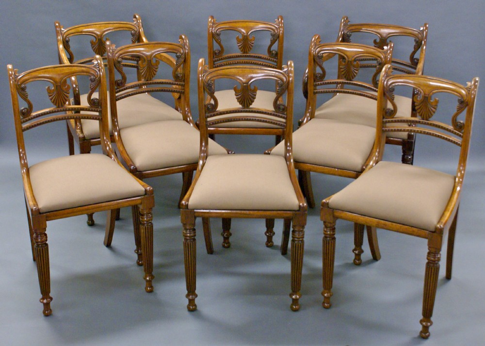 A fine set of 8 Regency mahogany dining chairs