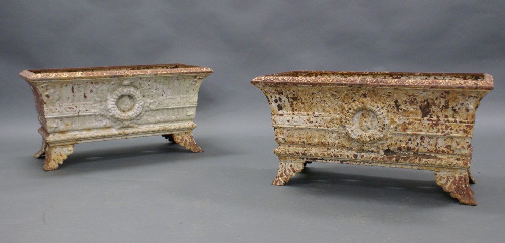 A pair late Regency, cast iron planters