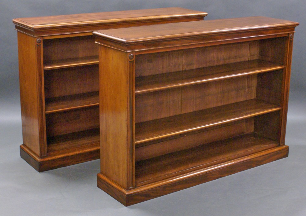A pair of Victorian mahogany open bookcases.