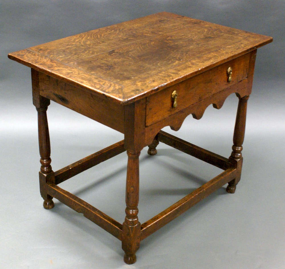 An early 18th century oak side table