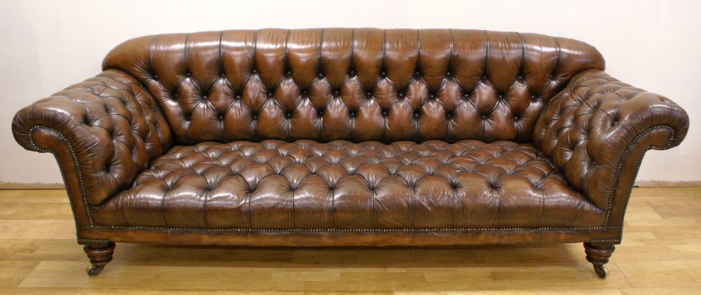 A large Victorian leather Chesterfield