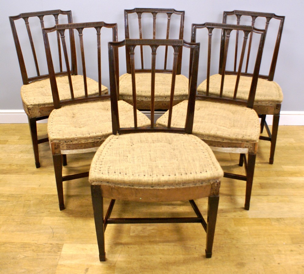A set of George III mahogany dining chairs