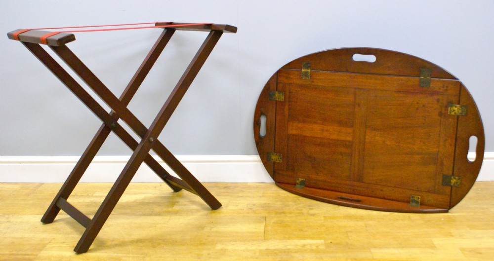 A 19th century mahogany Butlers tray on folding stand