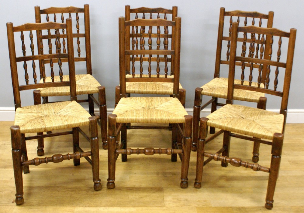 A good set of ash and rush seated country chairs.