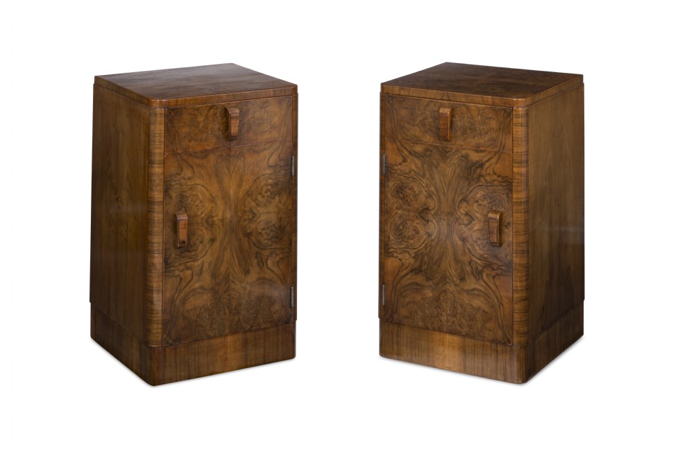 A pair of Art Deco bed side cupboards
