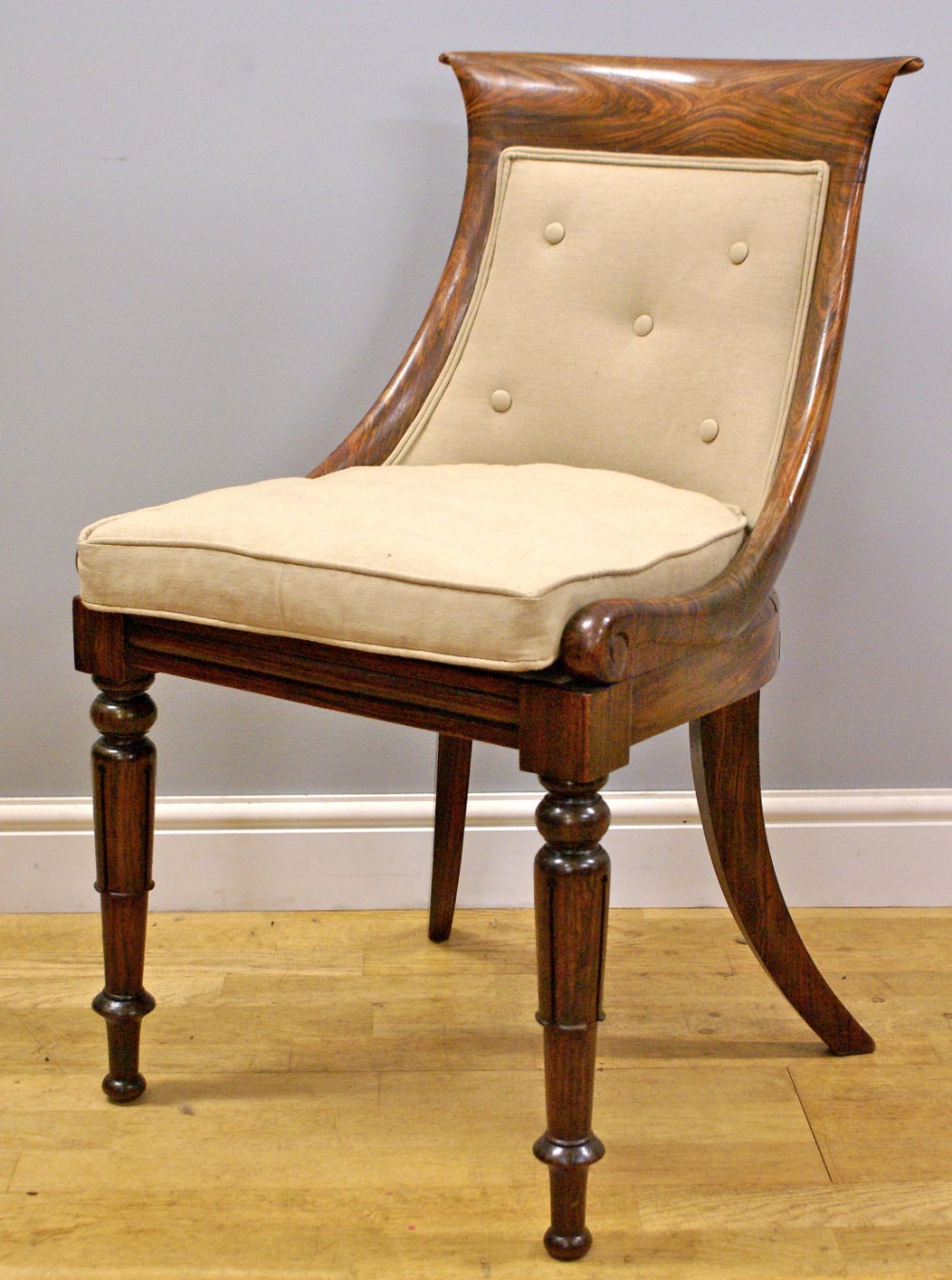 A late Regency, simulated rosewood tub chair