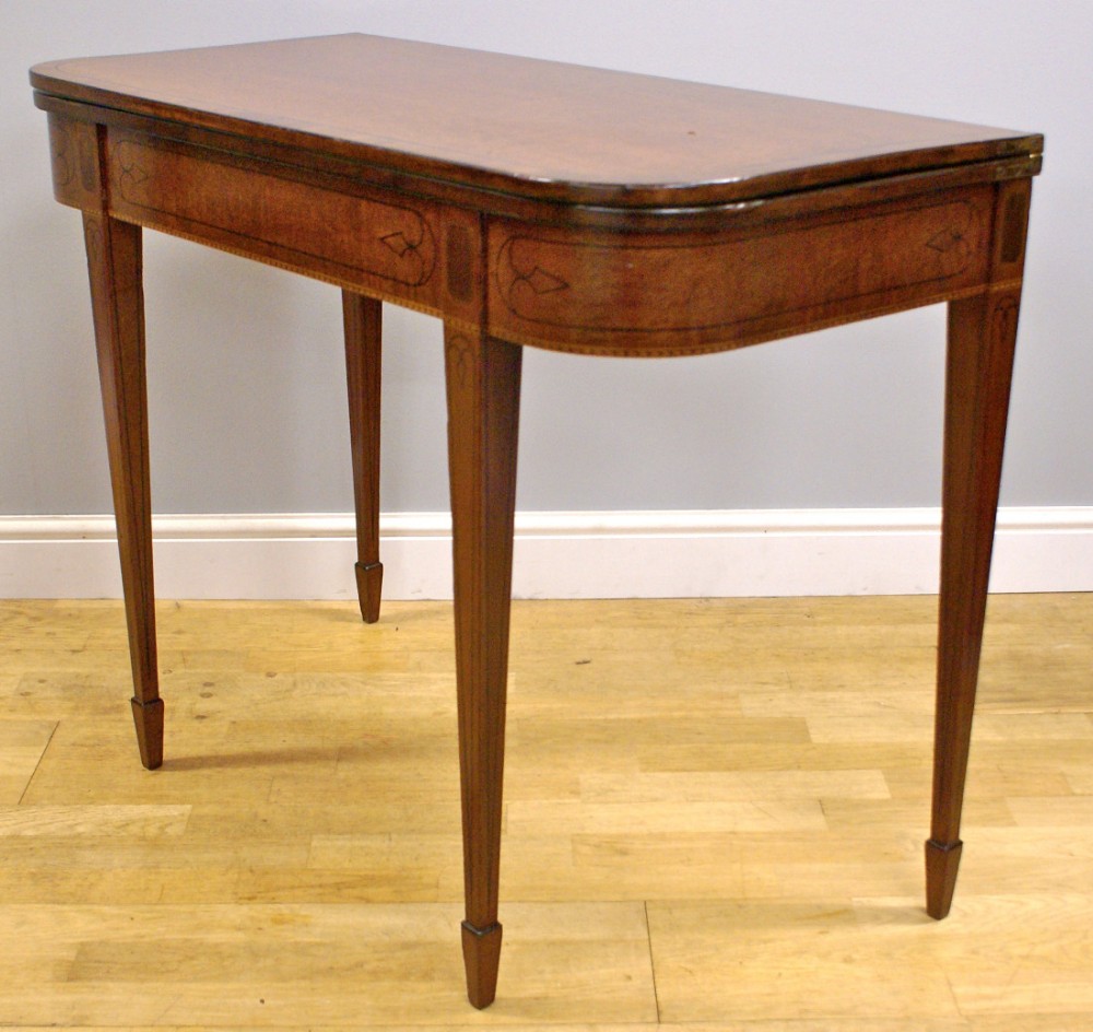 A George III Mahogany inlaid tea table
