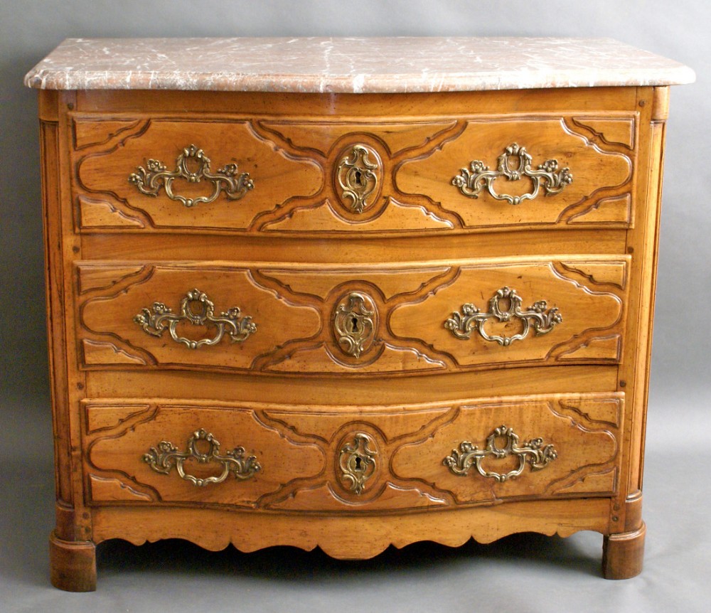A 19th century Continental walnut commode