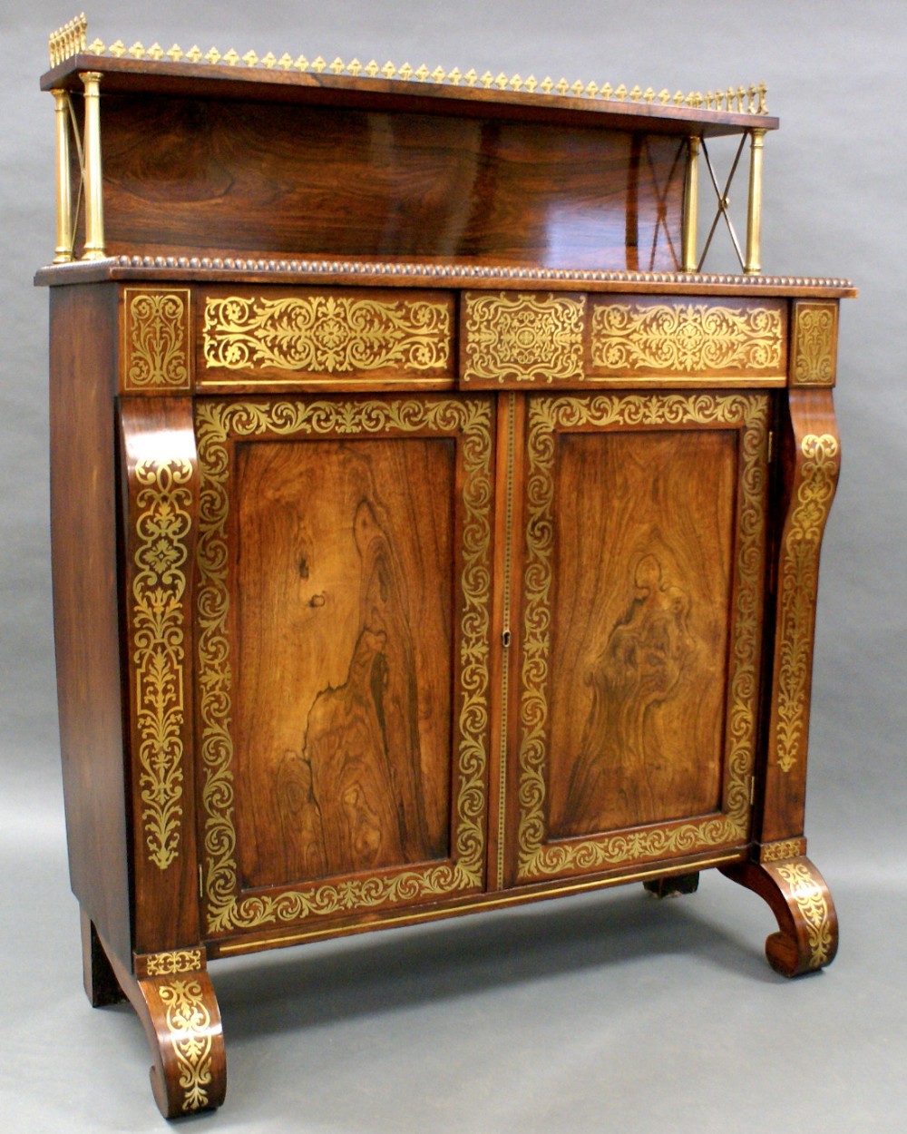 A superb Regency rosewood and brass inlaid chiffonier