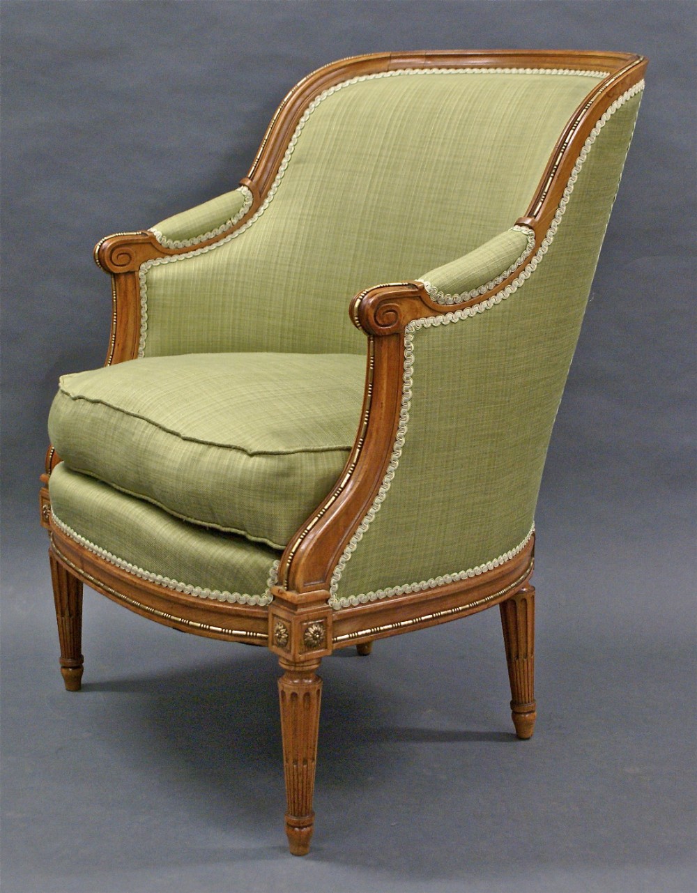 A very unusual French satinwood arm chair
