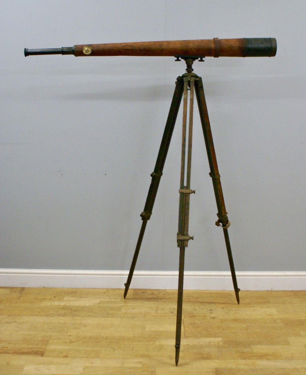 A brass and leather telescope by W. Ottway & Co.