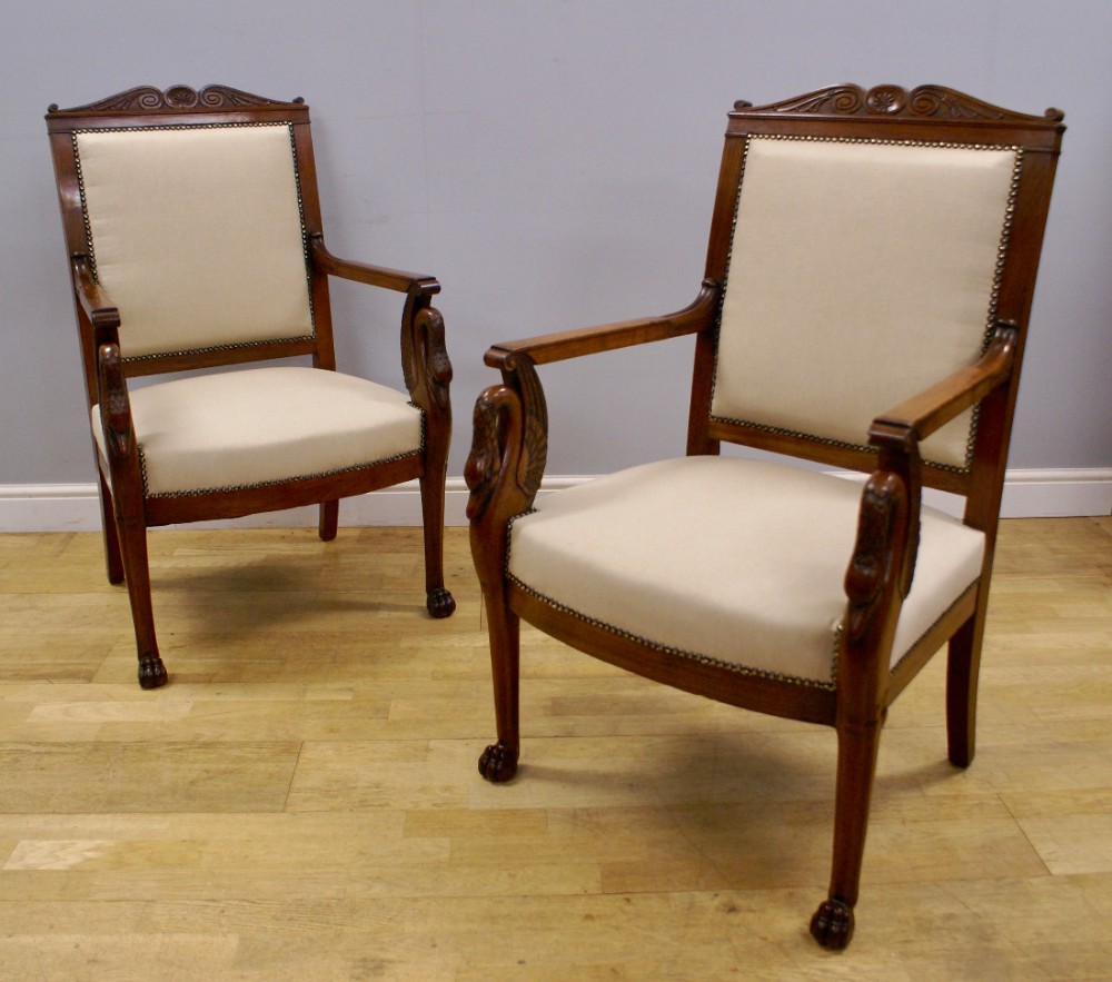 A fine pair of Swedish carved mahogany arm chairs