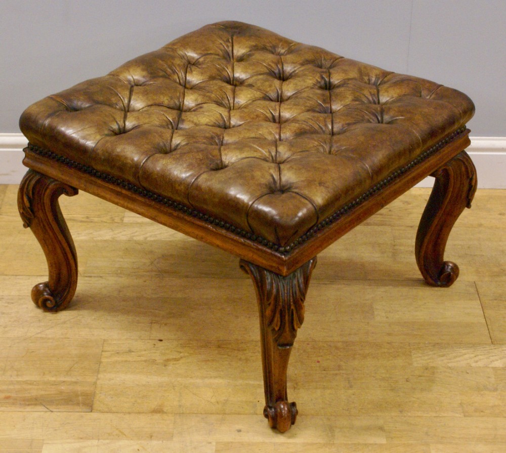A Victorian walnut cabriole leg stool.