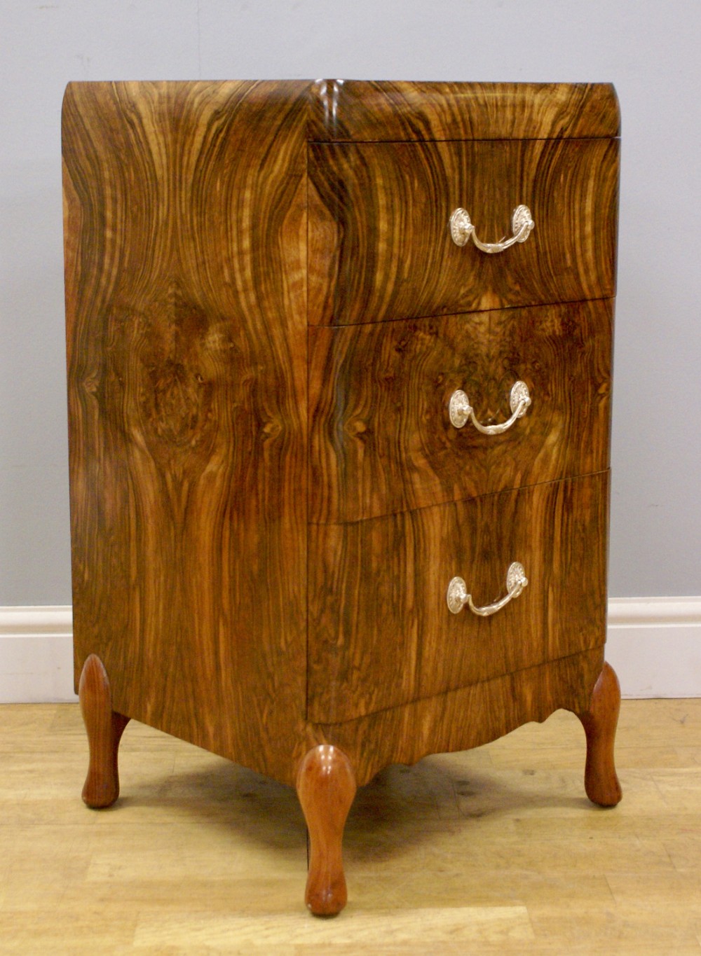 An Art Deco small chest of drawers by Maurice Adams