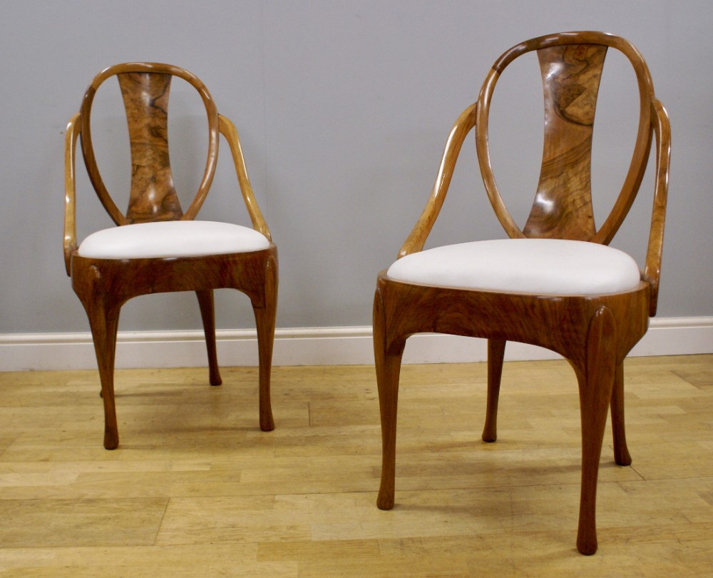 A pair of Maurice Adams arm chairs